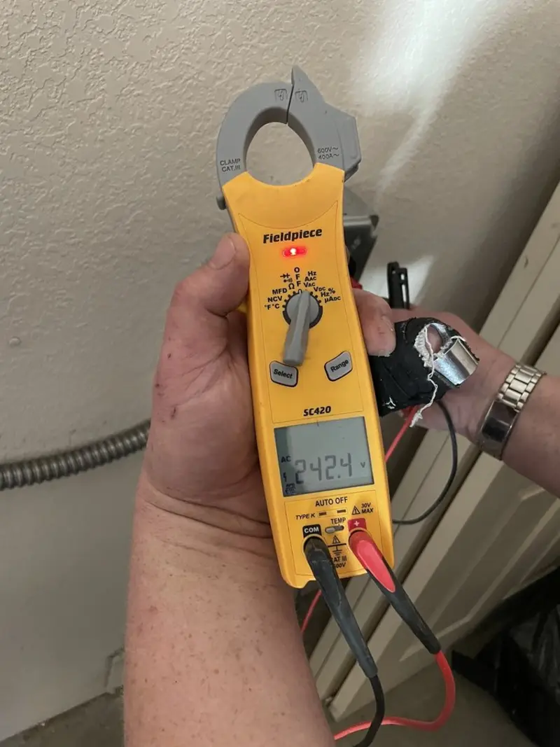 Voltage testing with clamp meter during Hot Tub / Pool Electrical Wiring in Four Corners